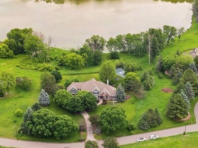 This setting feels like you're miles away from everything, but you're within 5 minutes to shopping, dining, coffee, schools and just a few more minutes to downtown Stillwater and the St. Croix River.