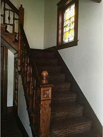 Exterior Front. The entrance is adorable with orig