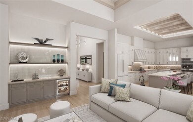 Living room featuring wine cooler, light wood-type