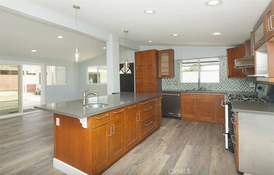 open floorplan, brand new kitchen w/ island, living room