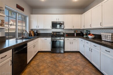 Solid Granite Counter Tops Accent the Bright White