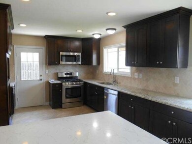 Beautiful remodeled kitchen with island.