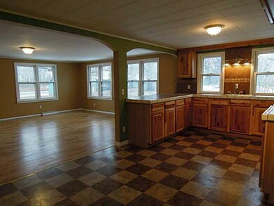 Kitchen. View from dinette area overlooks living r