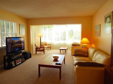 Living Room and Kitchen view from Florida Room