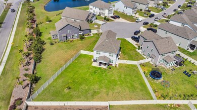 Bird's eye view with a water view and a residential view