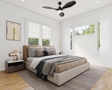 Bedroom with light wood-style flooring, recessed 