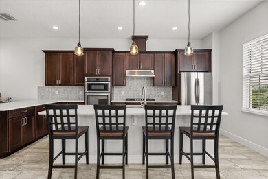 8915 Fountain Palm Aly, Winter Garden, FL 34787 - photo 3