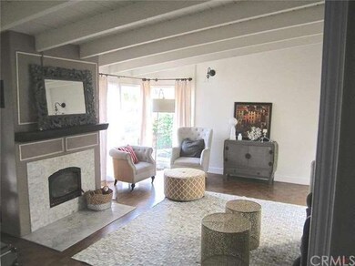 Parquet wood floors and large windows are an added