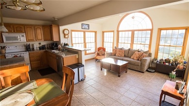 The family room flows into the eat in kitchen area