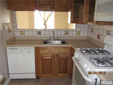 beautiful remodeled kitchen with pass through to d
