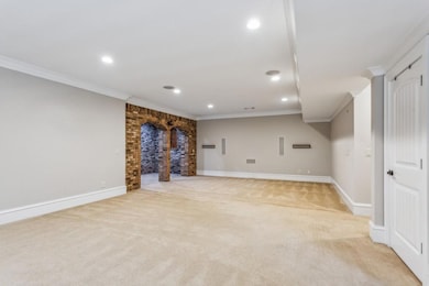 Fully Finished Daylight Basement With A Living Space, Wet Bar, Bedroom, & Full Bathroom