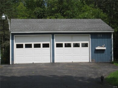 DETACHED 2.5 CAR GARAGE WITH OPENER TO STORE YOUR 