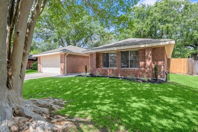 Home has mature crepe myrtle trees as well as a do