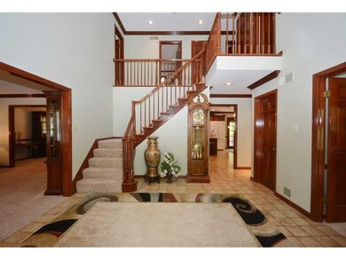 Entry/Foyer. THE GRACIOUS STAIRWAY LEADS TO AN OPE