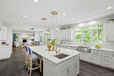 The kitchen boasts an enormous island with tons of
