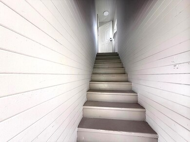 Wide steps lead to a charming 1-bedroom unit