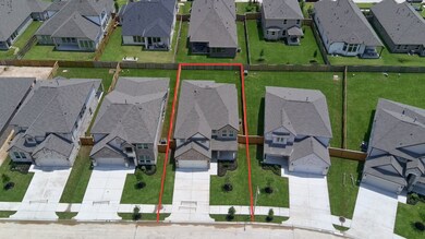 This home sits on a large lot with ample yard space in front and the back, lush landscaping and a well-maintained yard.