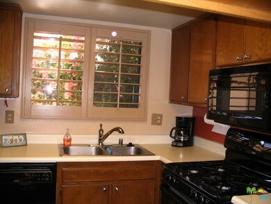 Window overlooks landscaped patio