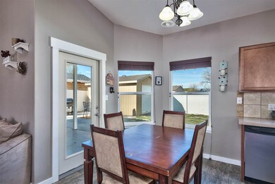 A single French door leads from the dining area ou