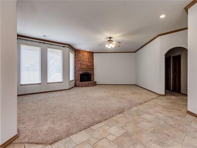 Enormous living room with large windows to let in the natural light!