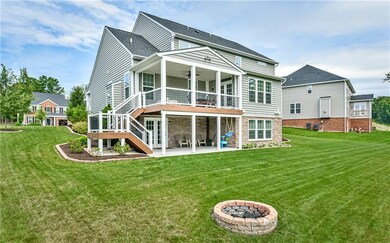 The rear of the home is as pretty as the front, wi