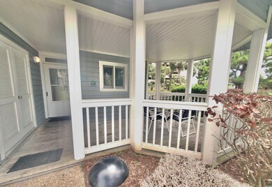 Sunroom / solarium with beamed ceiling and plenty 