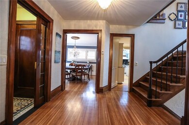 Spacios Foyer rich with hardwood floors, natural w