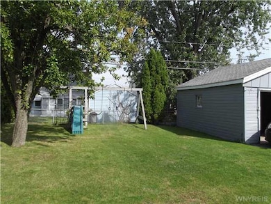 Backyard. Nicely groomed.