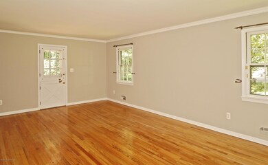 LR w/wood floors & door to deck