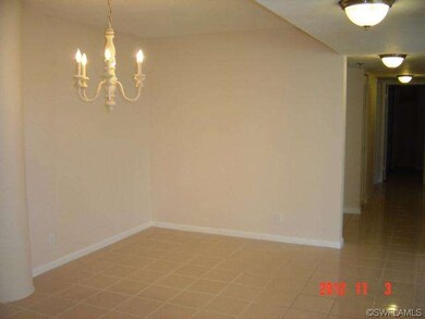 DINING ROOM AND HALLWAY TO GUEST BEDROOMS & BATHRO