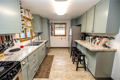 Updated kitchen with breakfast bar.