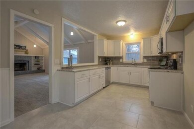 Open concept with view into the living room.