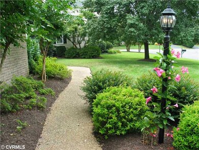 Exterior Front - Aggregate walk-way graciously con