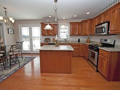 Kitchen. As you walk back the hallway from the ent