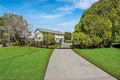 Private Drive w/ Gated Entry & Fenced Yard