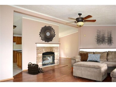 Wood burning fireplace is sure to warm this spacio