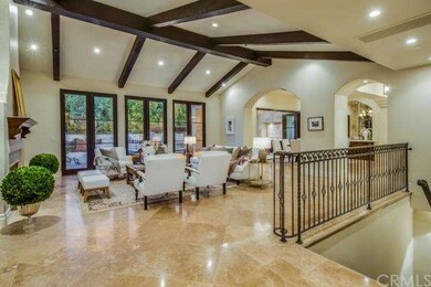 Gracious living room with fireplace, vaulted ceili