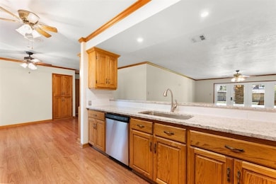 View of interior of Kitchen looking into Dining area.