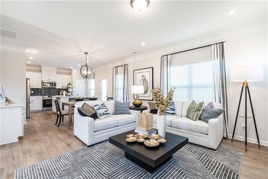Living area with ornamental molding, light wood-type flooring, a chandelier, recessed lighting, and baseboards
