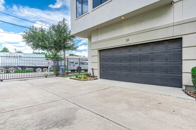 Two car garage with tall ceilings