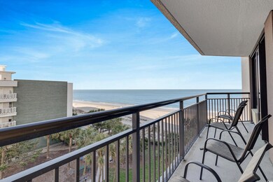 Balcony with a view of the beach and a water view