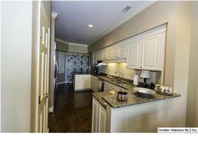 Kitchen with all granite countertops and Top of th
