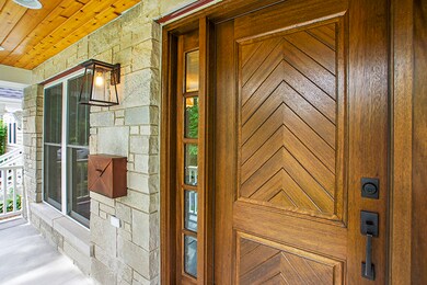 Large enclosed porch with beadboard ceiling and cu