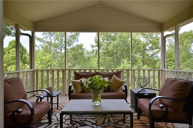 Great Room opens to Stunning Screened in Porch!