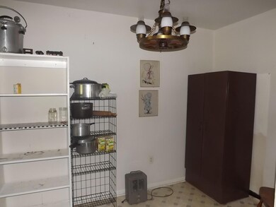 A dining area is located adjacent to the kitchen. 