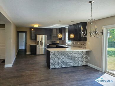 Dining room is open to kitchen