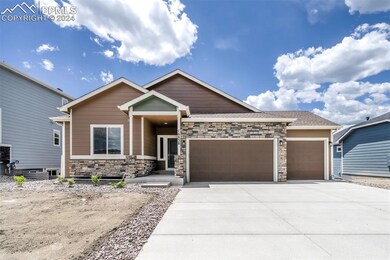 View of front of property with a garage
