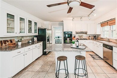 Large open concept Kitchen with granite countertops