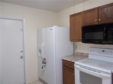 Kitchen showing door to the Garage