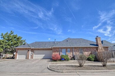 Ranch-style home with a garage